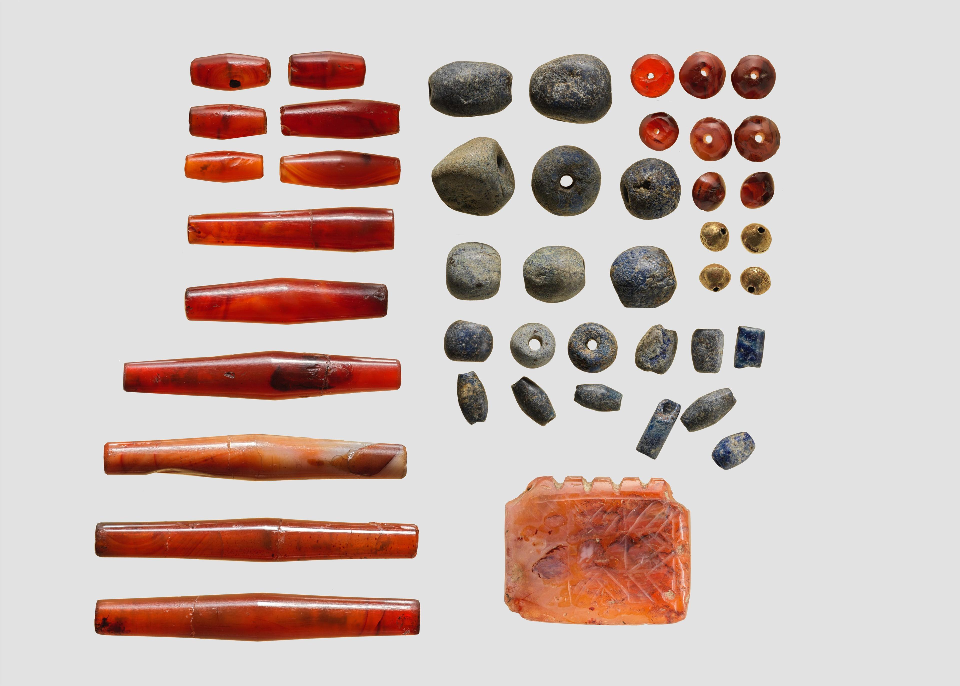 Early Bronze Age pendant and beads made with carnelian, lapis lazuli and gold
